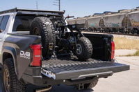 DV8 Offroad Truck Bed Universal Tire Carrier & Accessory Mount