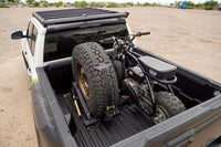 DV8 Offroad Truck Bed Universal Tire Carrier & Accessory Mount