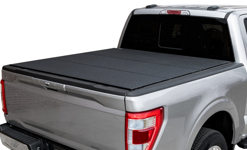 Access 17-24 Nissan Titan 5ft 6in Bed LOMAX Tri-Fold Cover - Urethane Diamond Plate