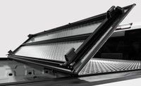Access 17-24 Nissan Titan 5ft 6in Bed LOMAX Tri-Fold Cover - Urethane Diamond Plate