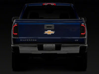 Raxiom 14-18 Chevrolet Silverado 1500 Axial Series LED Tail Lights- Black Housing (Smoked Lens)
