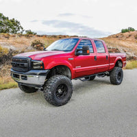 Westin 1999-2016 Ford F-250/F-350/F-450/F-550 Crew Cab Outlaw Drop Nerf Step Bars Textured Black