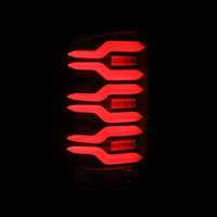 AlphaRex 14-18 GMC Sierra 1500/2500HD/3500HD LUXX-Series LED Tail Lights Blk w/Actv Light & Seq. Sig