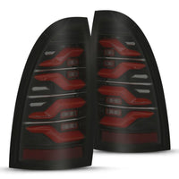 AlphaRex 05-15 Toyota Tacoma LUXX LED Taillights Blk/Red w/Activ Light/Seq Signal